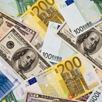 Евро дешевеет к доллару на статистике из Европы