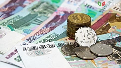 Рубль повышается к доллару и евро благодаря росту цен на нефть