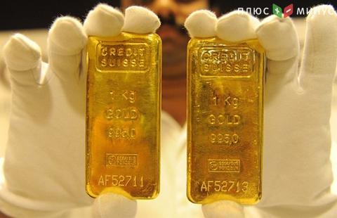 Золото понизилось к 1320 долл./унц.