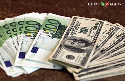 Доллар снижается к евро и стабилен к иене