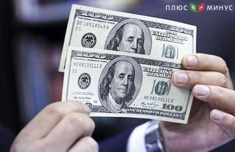 Доллар США слабо дешевеет после сильного роста днем ранее