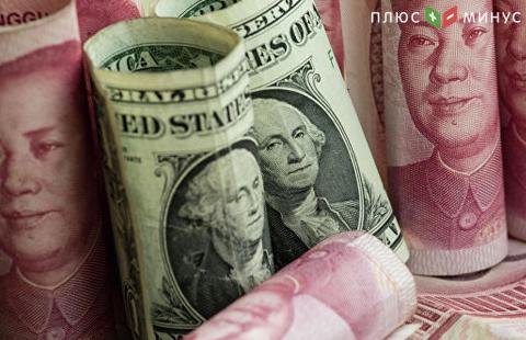 Центробанк Китая понизил юань к доллару до минимума с декабря 2018 года Центробанк Китая понизил юань к доллару до минимума с декабря 2018 года