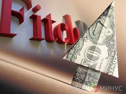 Действия Fitch поднимают курс доллара