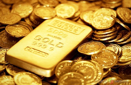 Золото дешевеет на фоне роста доллара и снижения котировок сырья