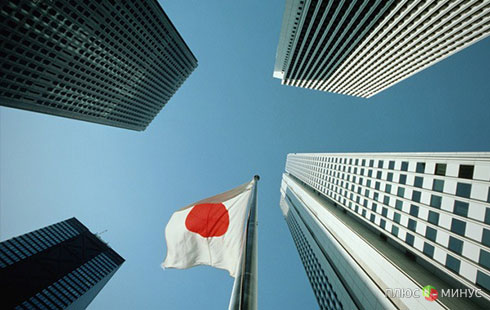 Япония терпеливо переносить издержки «абэномики»