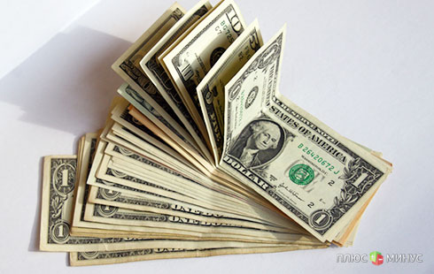 Доллар вырос к недельному максимуму против евро